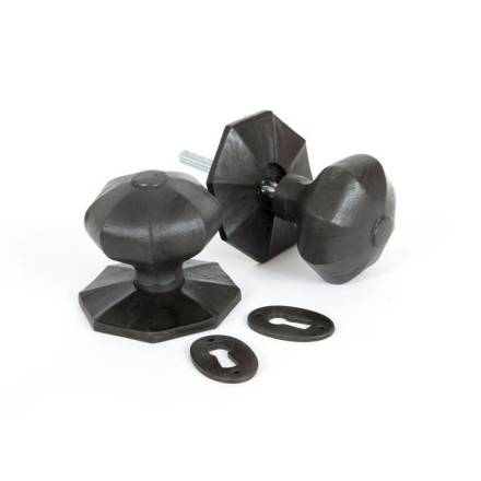 A Perry Japanned Octagonal Rim/Mortice Door Furniture